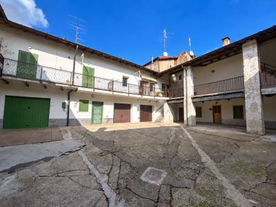 INDUNO OLONA, PORZIONE TERRACIELO CON BOX E LOCALE SGOMBERO